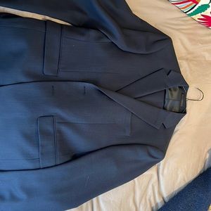 Calvin Kline navy blue suit worn a few times. Perfect condition.